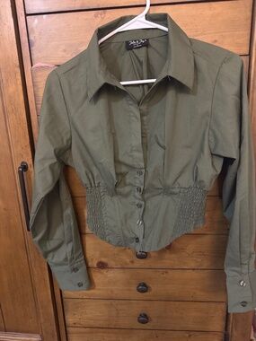 Army green cropped jacket.